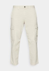 Béžové cargo kalhoty z bavlny, se dvěma bočními kapsami, zapínáním na knoflíky a střihem s rovnými nohavicemi. Mají jemnou texturu a detaily prošívání.