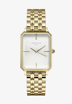 Gouden rechthoekige horloge met een getextureerde witte wijzerplaat, dunne gouden wijzers en een roestvrijstalen armband met afwisselend gepolijste en matte schakels.