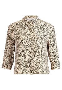 Leopard print button-up shirt with a light beige background, long sleeves, two chest pockets, and rounded hem. Fabric has a smooth texture.