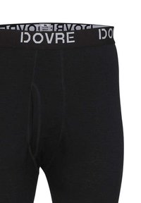Svart lange undertøy laget av mykt stoff, med en bred elastisk midjebånd med "DOVRE" merket i kontrasterende hvit skrift.