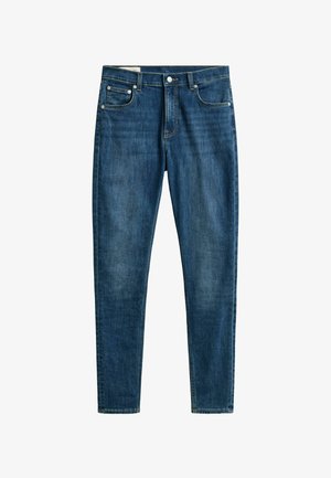 Blauwe skinny-fit spijkerbroek met knopen aan de voorkant en ritssluiting, vijfzakkenontwerp en lichte vervaging op dijen en knieën.