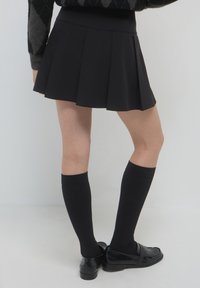 Calliope SKATER FIBBIE - Jupe trapèze - ultrablack