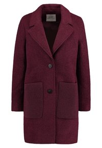 Burgunderfarbener Woll-Mix-Mantel mit Reverskragen, zwei Vorderaschen und einem Knopfverschluss. Strukturierter Stoff mit einem dezenten Muster.