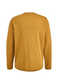 Langarmshirt in senfgelb aus strukturiertem Stoff. Verfügt über einen runden Halsausschnitt und einen lockeren Schnitt mit geradem Saum.