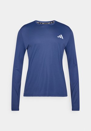 Langärmeliges Sportshirt aus leichtem, atmungsaktivem Stoff in Dunkelmarineblau, mit einem kleinen weißen Logo auf der Brust.