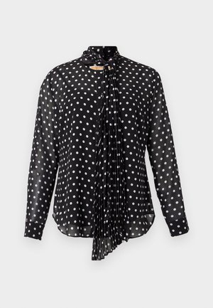 Juoda ilgarankovė palaidinė su balta taškuota rašto. Priekyje yra klostėtas raištelis ir apvali apačia. Pagaminta iš lengvos, permatomos medžiagos.