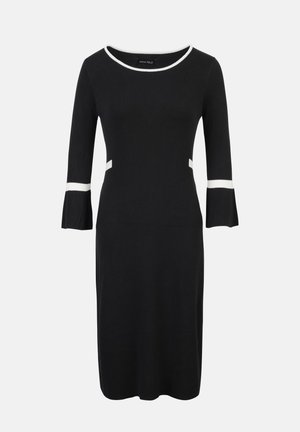 Robe noire à rayures avec des manches évasées trois-quarts, présentant des accents blancs au niveau du décolleté et de la taille. Texture lisse et silhouette ajustée.