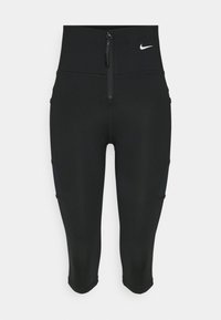 Black capri leggings made of stretchy fabric, featuring a front zip and side pockets, with a small white logo on the waistband.