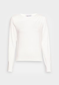 Camisola de manga longa branca feita de tecido suave, com um decote redondo, um corte solto e detalhes de costura discretos ao longo dos ombros.