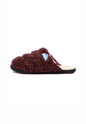 Red and black fuzzy slipper with a textured upper, featuring a black rubber sole and a blue brand logo stitched on the side.