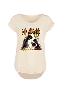 Cremfarbener T-Shirt mit lockerer Passform. Besondere Merkmale sind ein farbenfrohes Def Leppard "Hysteria"-Grafikdesign in Schwarz und lebhaften Akzenten in Gelb, Orange und Grün.