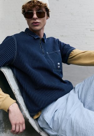 adidas Originals GRAPHIC  - Polosärk - medium blue denim