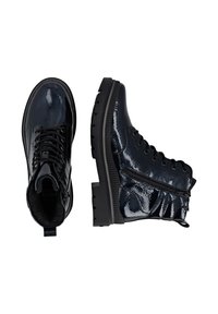 Black patent leather ankle boots with a textured finish, round toe, sturdy rubber sole, and side zip for easy entry.