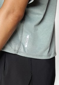 ASICS NAGINO RUN TOP - T-shirt de sport - monument blue