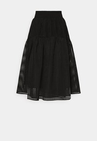 Jupe noire avec un design à volants, fabriquée en tissu texturé avec un motif en grille, taille élastique et ourlet mi-long.