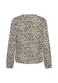 Blouse à manches longues avec motif floral noir et blanc complexe, vue de dos avec ourlet droit et coupe décontractée.