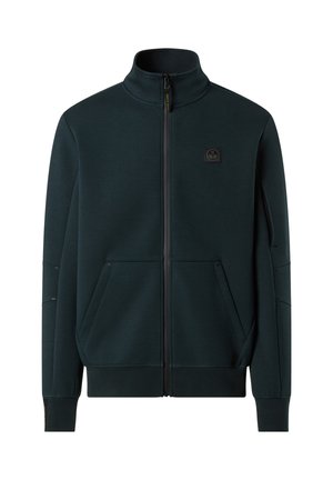 Felpa con zip di colore verde scuro, collo alto, due tasche frontali e logo ricamato sul petto. Tessuto morbido con polsini a coste.