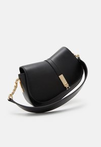 Tommy Hilfiger HERITAGE SADDLE BAG - Käekott - black