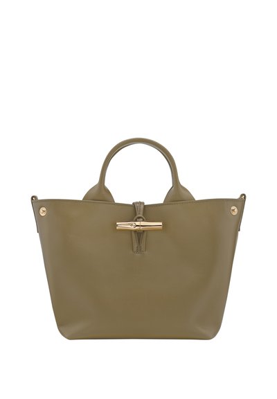 Olive green leather handbag with a structured shape, dual top handles, and a gold-tone hardware closure at the front.
