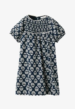 Abito blu navy con motivo floreale bianco, corpetto arricciato, maniche corte a sbuffo e bordo del collo smerlato.