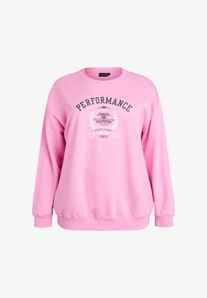 Svetlo ružová mikina s okrúhlym výstrihom, rebrovanými manžetami a lemom. Na prednej strane grafická potlač s nápisom "PERFORMANCE" a logom.