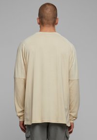 Urban Classics RAGLAN BACK LONGSLEEVE - Hosszú ujjú felső - sand