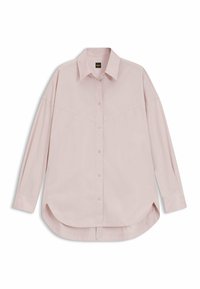 Light pink button-up shirt with a structured collar, long sleeves, and a rounded hem; features a front yoke seam and subtle stitching details.