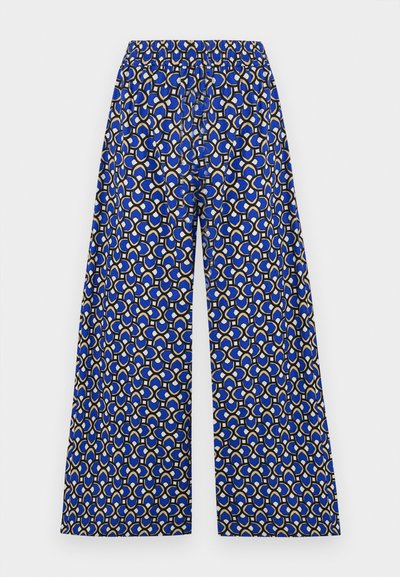 Wide-leg trousers in blue fabric featuring a geometric pattern of cream and gold circles. Elastic waistband for comfort.