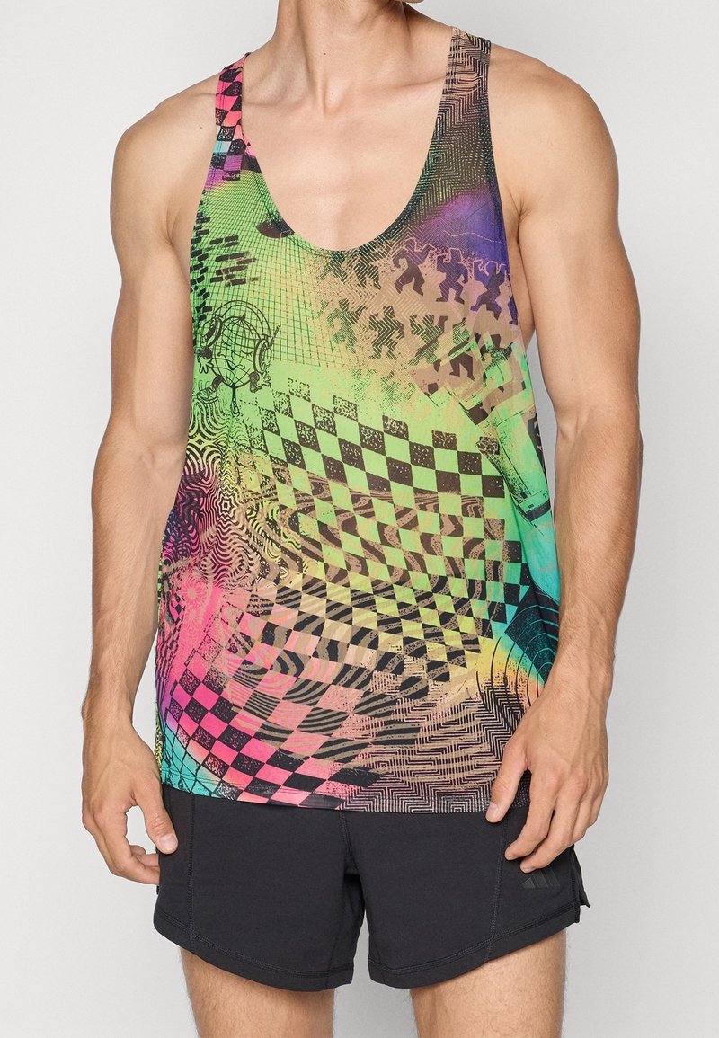 Débardeur multicolore avec un motif psychédélique en noir et couleurs pastel. Confectionné dans un tissu léger, il présente un col rond.