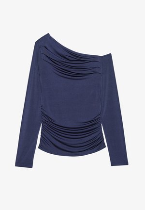 Navy long-sleeve top with asymmetric neckline, featuring gathered texture on the front and side ruching. Made from a smooth, stretchy fabric.