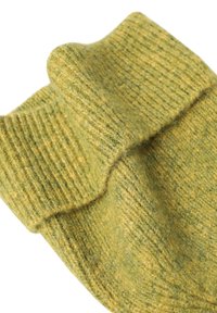 Green knitted socks with a ribbed texture, featuring a folded cuff and a blend of light and dark green tones. Soft wool material.