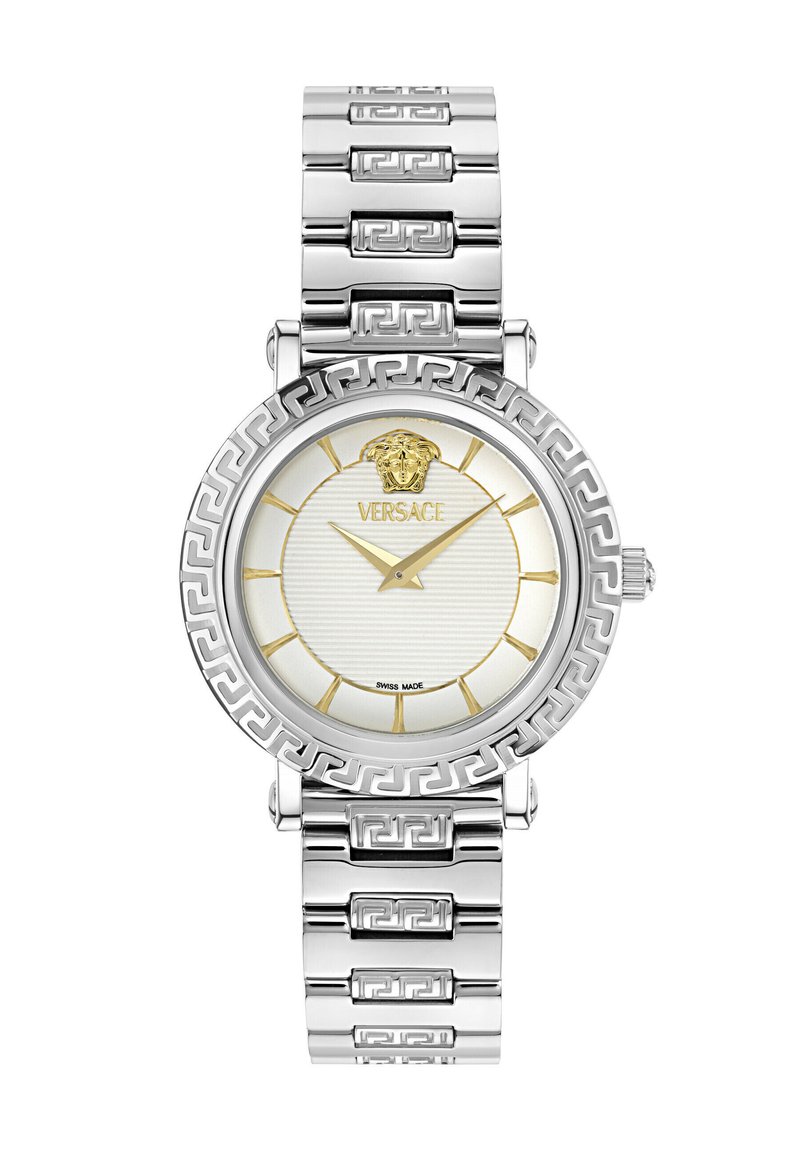 Silberne und goldene Versace-Armbanduhr mit Medusa-Logo, goldenen Stundenmarkierungen und Zeigern sowie einem griechischen Schlüsselmuster auf der Lünette und dem Armband.