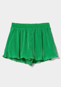 Zelené skládací kraťasy s elastickým pasem, s měkkou, lesklou texturou a rozšířeným tvarem. Lem je mírně zaoblený.