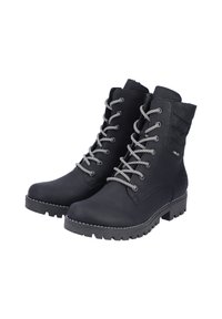 Bottines en cuir noir avec un détail en tissu matelassé, lacets en argent et semelle en caoutchouc texturé. Présente des coutures contrastées et un design à bout rond.