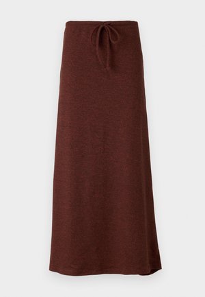 Pruun, pikk, kudumisküüruga seelik, millel on tõmblukk. Sile tekstuur, veidi laienev disain ja ühtlane värv ilma mustrite või aktsentideta.