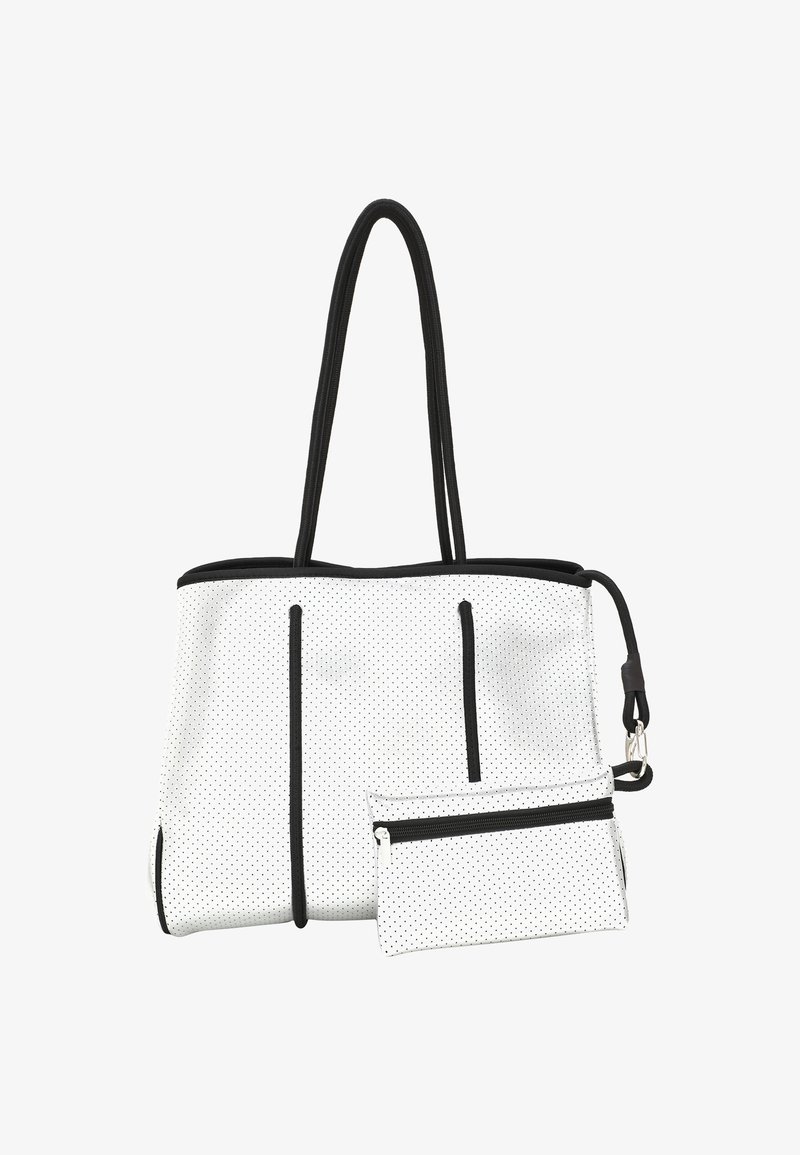 Sac fourre-tout blanc avec accents noirs et motif à pois, doté de deux poches extérieures zippées et d'une pochette amovible plus petite.
