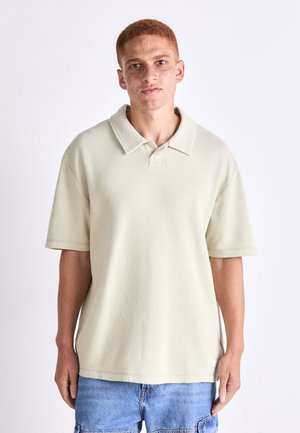 - Koszulka polo
