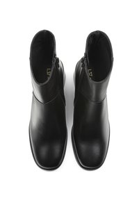 Black leather ankle boots with a smooth texture, square toe, and side zippers for easy wear. Clean, modern design with minimal accents.
