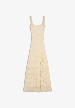 Krém színű, csipkés ujjatlan maxiruha vékony pántokkal és fodros részletekkel az elülső hasítéknál.