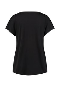 Zwarte t-shirt met korte mouwen en een ronde hals, gemaakt van zachte katoen, heeft een relaxte pasvorm en een rechte zoom.