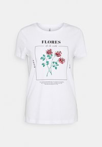 Bílý bavlněný tričko s květinovým grafickým vzorem červených růží a zelených listů. Text zní "FLORES de la vida" s dalšími citáty níže.