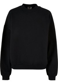 Svart cropped sweatshirt med rund hals, senkede skuldre og ribbestrikkede mansjetter. Laget av strukturerte tekstiler, med et enkelt design.