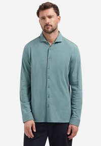 Lange mouwen shirt in een zachte teal stof met een kraag, knoopsluiting aan de voorkant en een comfortabele pasvorm. Glad textuur zonder patronen.