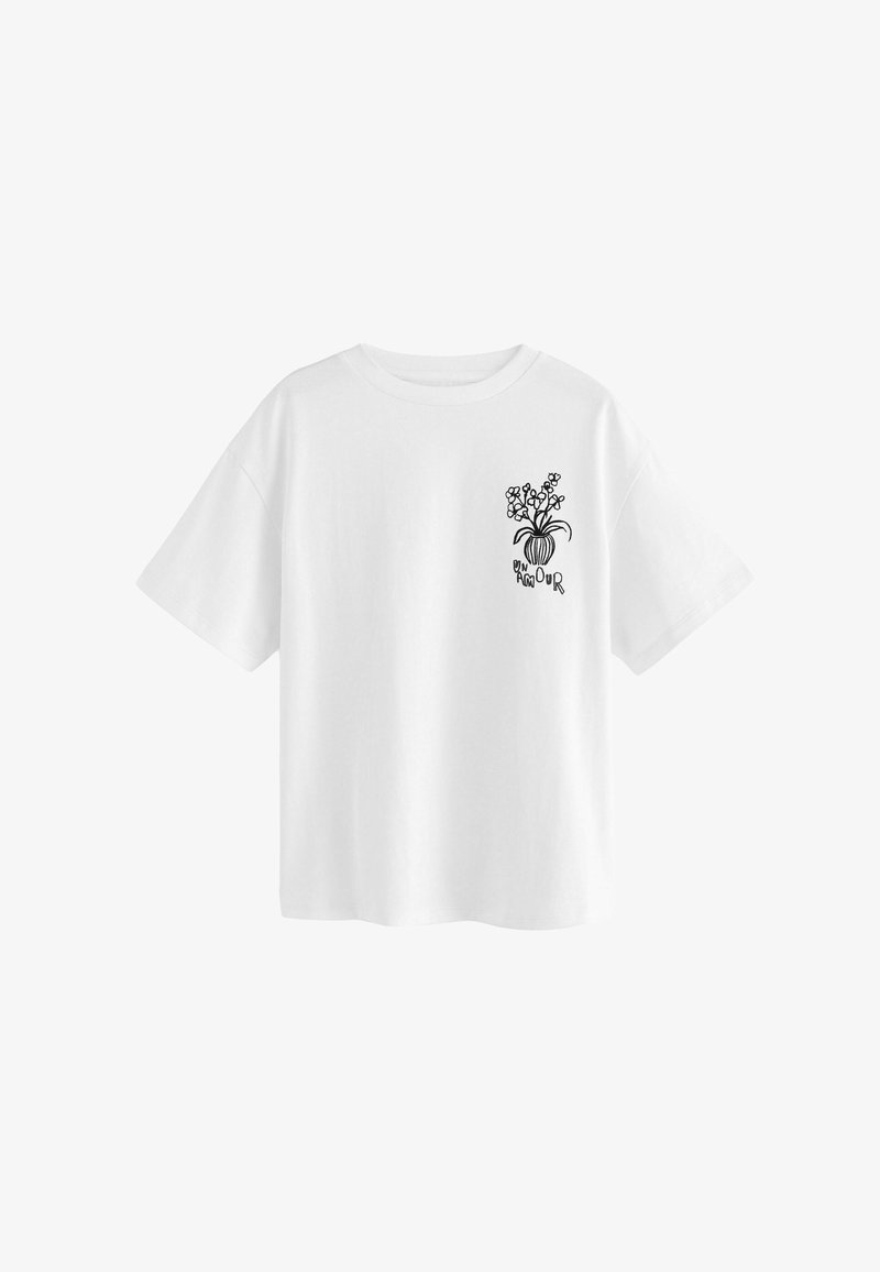 Hvid bomulds T-shirt med korte ærmer, der har en sort stregtegning af en vase med blomster og teksten "EN AMOUR" under.