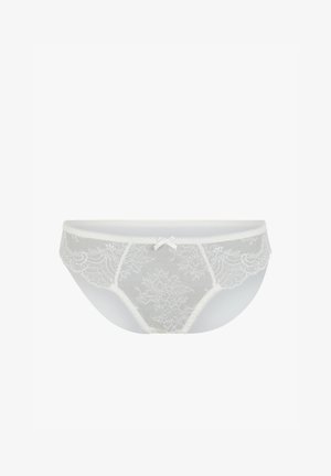 String en dentelle avec un design blanc transparent et des motifs floraux. Équipé d'un petit nœud au centre et terminé par des bords festonnés.