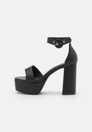 LAMODA WONDERLAND - Magas sarkú szandálok - black
