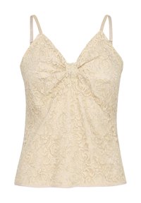 Camisola in pizzo di un leggero beige con spalline regolabili, caratterizzata da un dettaglio con fiocco frontale e un motivo floreale su tutto il tessuto. Texture liscia.