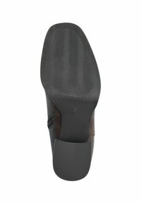 Semelle de chaussure en cuir dotée d'une base en caoutchouc noir texturée avec des rainures pour l'adhérence et une section lisse au talon, marquée de la taille 37.