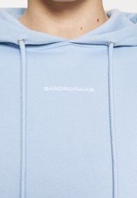 sandro Jersey con capucha - light blue