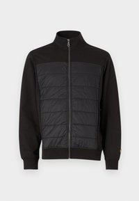 Must öökohvri, millel on pehme esiosa, kõrge krae ja soonikud mansetid. Tekstuuriga kude kontrastib siledaga. Diskreetne logo aktsent.